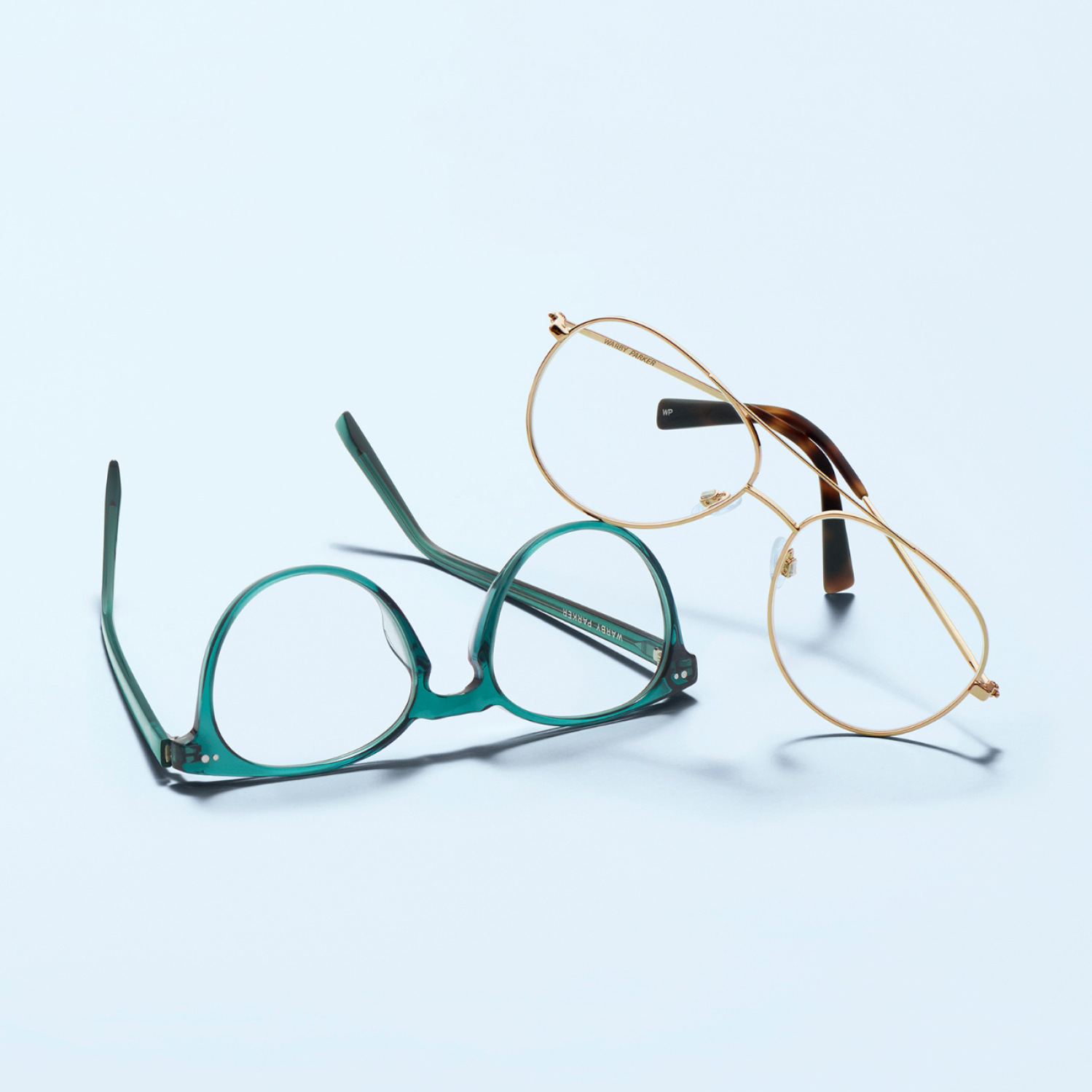 two pairs of blue light glasses