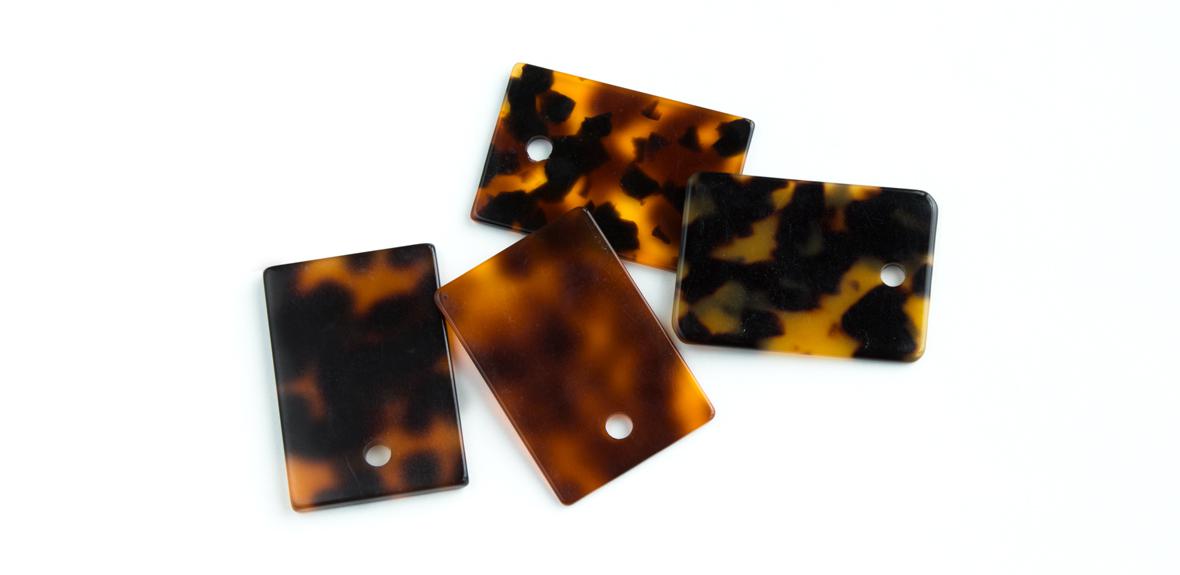 Four mottled acetate samples