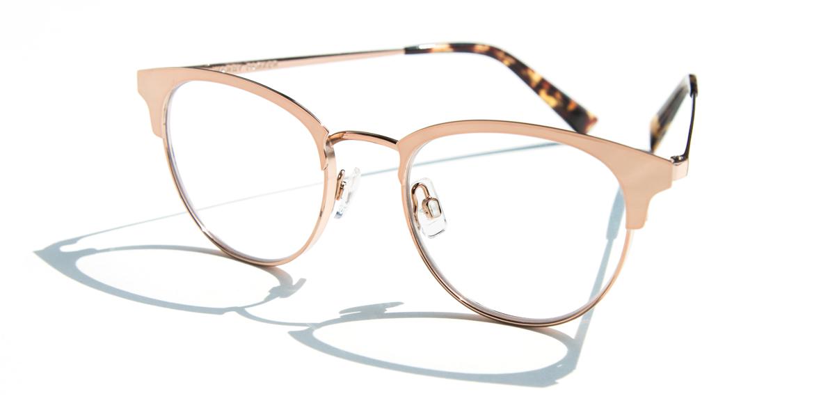 Pair of glasses casting a shadow on a white background