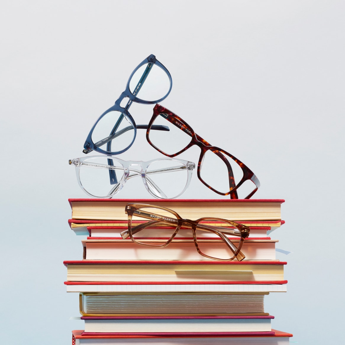 Glasses on a stack of books
