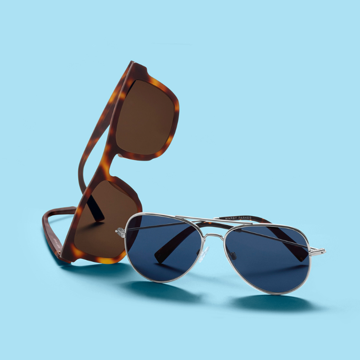 Two pairs of prescription sunglasses